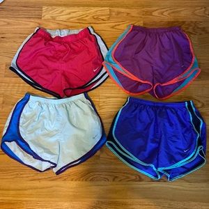 **LOT OF 4 WOMENS NIKE SHORTS SIZE MEDIUM**